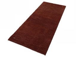 Corner detail of New Persian Gabbeh rug showing border pattern and Wool pile