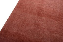 Backside of handmade New Persian Gabbeh rug showing knot structure and weave density