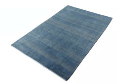 Corner detail of New Persian Gabbeh rug showing border pattern and Wool pile
