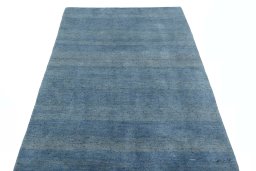 Surface texture of New Persian Gabbeh rug with natural Wool and intricate pattern
