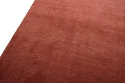 Backside of handmade New Persian Gabbeh rug showing knot structure and weave density