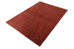 Corner detail of New Persian Gabbeh rug showing border pattern and Wool pile
