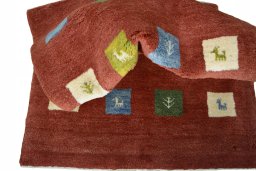 Corner detail of New Persian Gabbeh rug showing border pattern and Wool pile