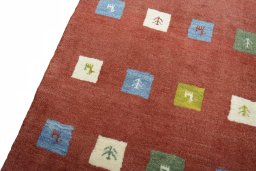 Backside of handmade New Persian Gabbeh rug showing knot structure and weave density