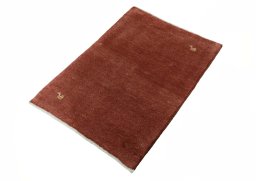 Corner detail of New Persian Gabbeh rug showing border pattern and Wool pile