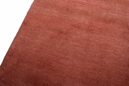 Backside of handmade New Persian Gabbeh rug showing knot structure and weave density