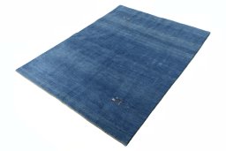Corner detail of New Persian Gabbeh rug showing border pattern and Wool pile
