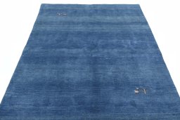 Surface texture of New Persian Gabbeh rug with natural Wool and intricate pattern