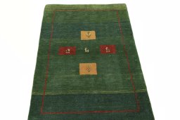 Surface texture of New Persian Gabbeh rug with natural Wool and intricate pattern