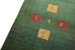 Backside of handmade New Persian Gabbeh rug showing knot structure and weave density