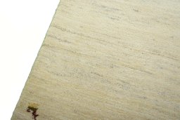 Backside of handmade New Persian Gabbeh rug showing knot structure and weave density