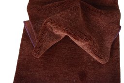 Corner detail of New Persian Gabbeh rug showing border pattern and Wool pile