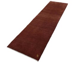 Corner detail of New Persian Gabbeh rug showing border pattern and Wool pile
