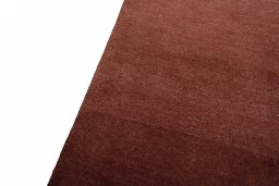 Backside of handmade New Persian Gabbeh rug showing knot structure and weave density