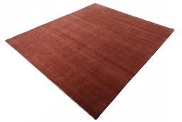 Corner detail of New Persian Gabbeh rug showing border pattern and Wool pile