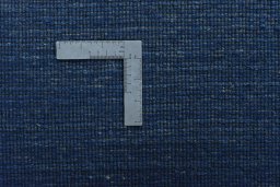 Close-up detail of New Persian Gabbeh rug from Iran / Persia showing Wool weave