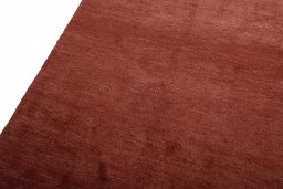 Backside of handmade New Persian Gabbeh rug showing knot structure and weave density