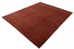 Corner detail of New Persian Gabbeh rug showing border pattern and Wool pile