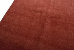 Backside of handmade New Persian Gabbeh rug showing knot structure and weave density