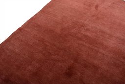 Backside of handmade New Persian Gabbeh rug showing knot structure and weave density