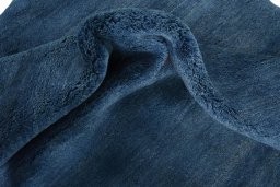 Corner detail of New Persian Gabbeh rug showing border pattern and Wool pile