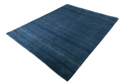 Corner detail of New Persian Gabbeh rug showing border pattern and Wool pile