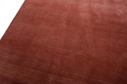 Backside of handmade New Persian Gabbeh rug showing knot structure and weave density