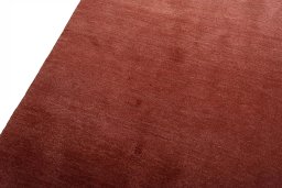 Backside of handmade New Persian Gabbeh rug showing knot structure and weave density