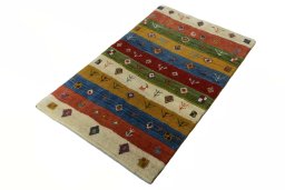 Corner detail of New Persian Gabbeh rug showing border pattern and Wool pile