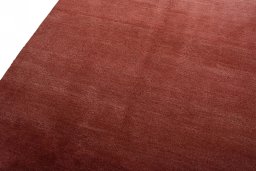 Backside of handmade New Persian Gabbeh rug showing knot structure and weave density