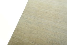 Backside of handmade New Persian Gabbeh rug showing knot structure and weave density