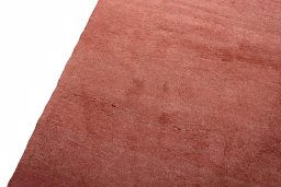 Backside of handmade New Persian Gabbeh rug showing knot structure and weave density