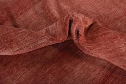 Corner detail of New Persian Gabbeh rug showing border pattern and Wool pile