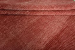 Full view of New Persian Gabbeh rug from Iran / Persia, 415 × 305 cm in Red tones
