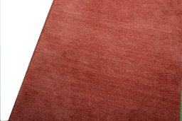 Backside of handmade New Persian Gabbeh rug showing knot structure and weave density