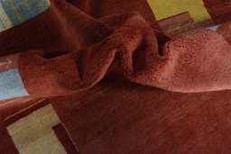Corner detail of New Persian Gabbeh rug showing border pattern and Wool pile