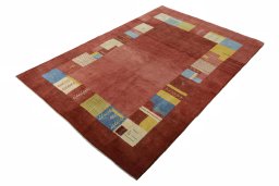 Corner detail of New Persian Gabbeh rug showing border pattern and Wool pile