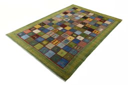 Corner detail of New Persian Gabbeh rug showing border pattern and Wool pile