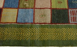 Close-up detail of New Persian Gabbeh rug from Iran / Persia showing Wool weave