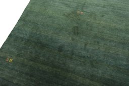 Backside of handmade New Persian Gabbeh rug showing knot structure and weave density