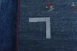 Close-up detail of New Persian Gabbeh rug from Iran / Persia showing Wool weave