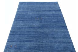 Surface texture of New Persian Gabbeh rug with natural Wool and intricate pattern