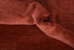 Corner detail of New Persian Gabbeh rug showing border pattern and Wool pile