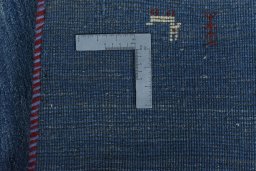 Close-up detail of New Persian Gabbeh rug from Iran / Persia showing Wool weave