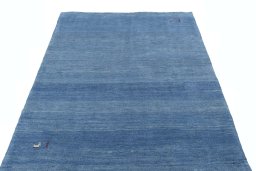 Surface texture of New Persian Gabbeh rug with natural Wool and intricate pattern