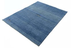 Corner detail of New Persian Gabbeh rug showing border pattern and Wool pile