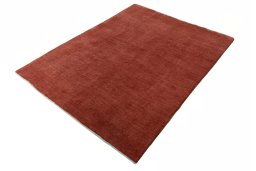 Corner detail of New Persian Gabbeh rug showing border pattern and Wool pile