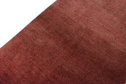 Backside of handmade New Persian Gabbeh rug showing knot structure and weave density