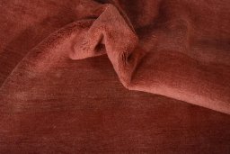 Corner detail of New Persian Gabbeh rug showing border pattern and Wool pile
