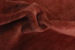 Corner detail of New Persian Gabbeh rug showing border pattern and Wool pile